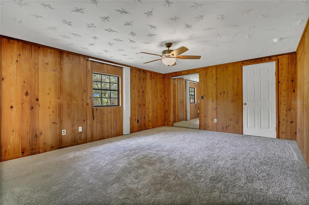 9 Sunny Road Ormond Beach, FL 32174 - Photo 8 of 33 a view of an empty room with a window