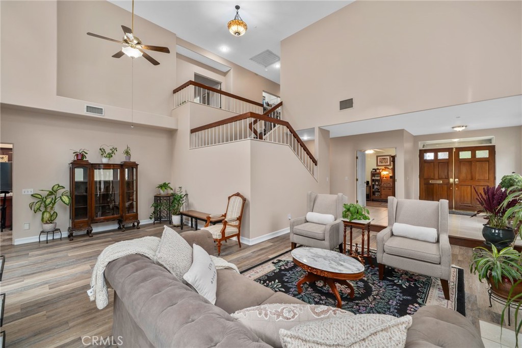 334 Lakeside Avenue Redlands, CA 92373 - Photo 11 of 63 a living room with furniture and wooden floor