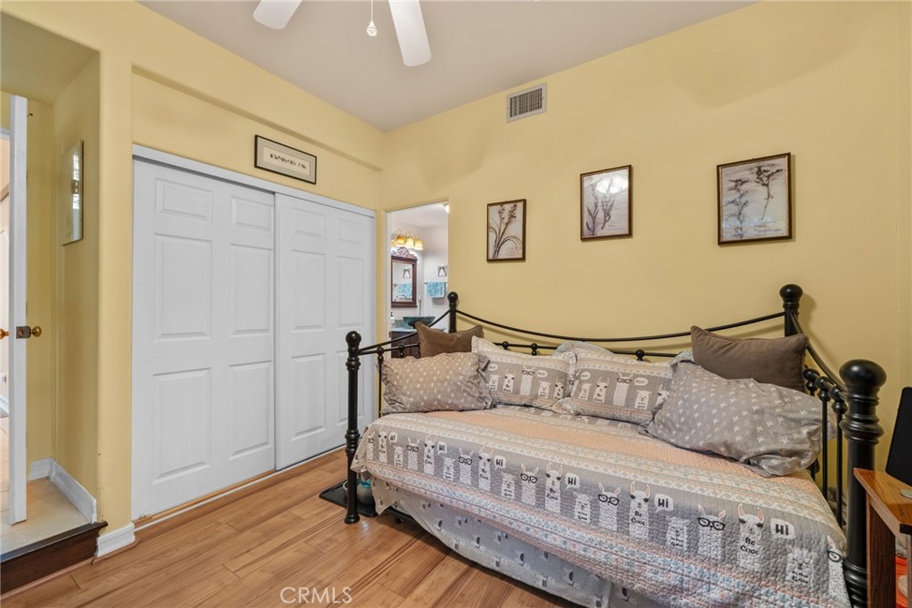 334 Lakeside Avenue Redlands, CA 92373 - Photo 19 of 63 a bedroom with a bed and a window