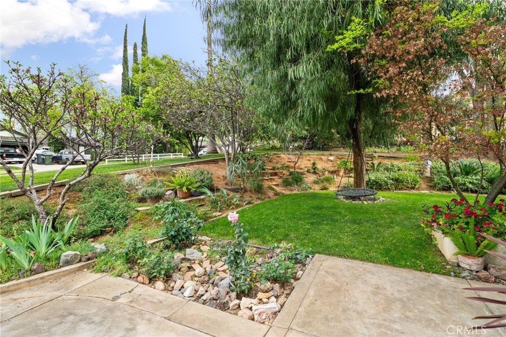 334 Lakeside Avenue Redlands, CA 92373 - Photo 7 of 63 a view of a garden with large trees