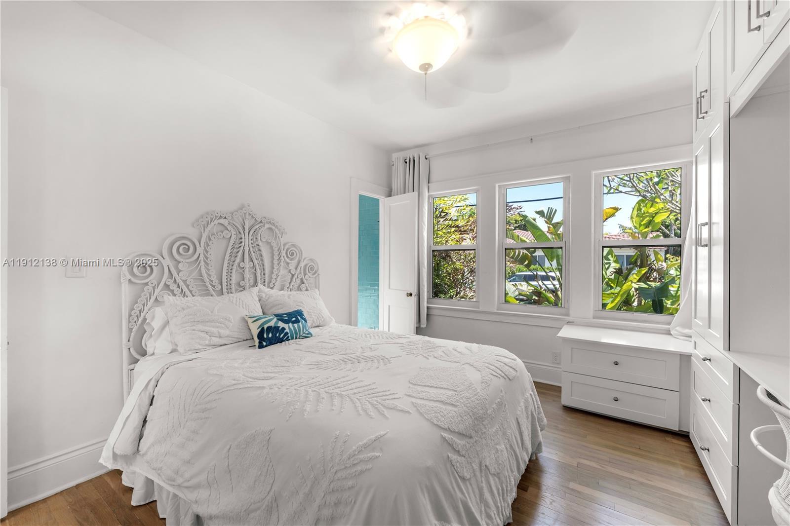 1601 Washington Street Hollywood, FL 33020 - Photo 11 of 41 a bedroom with a bed and a large window