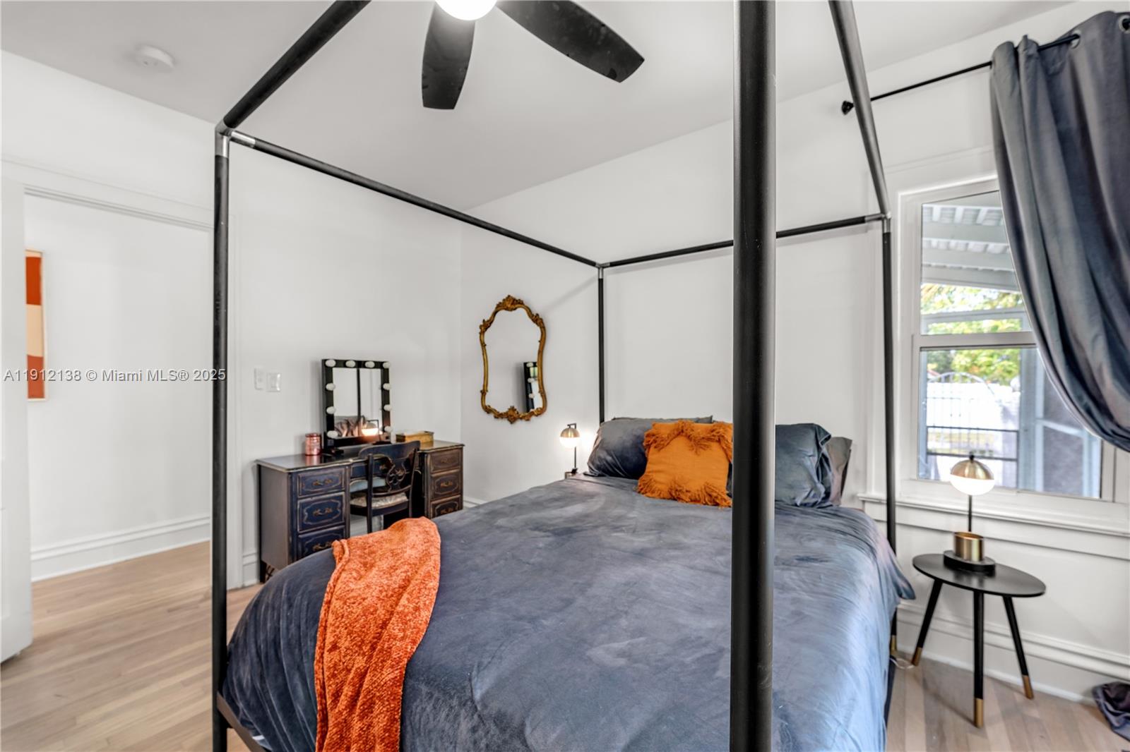 1601 Washington Street Hollywood, FL 33020 - Photo 14 of 41 a bedroom with furniture and a window