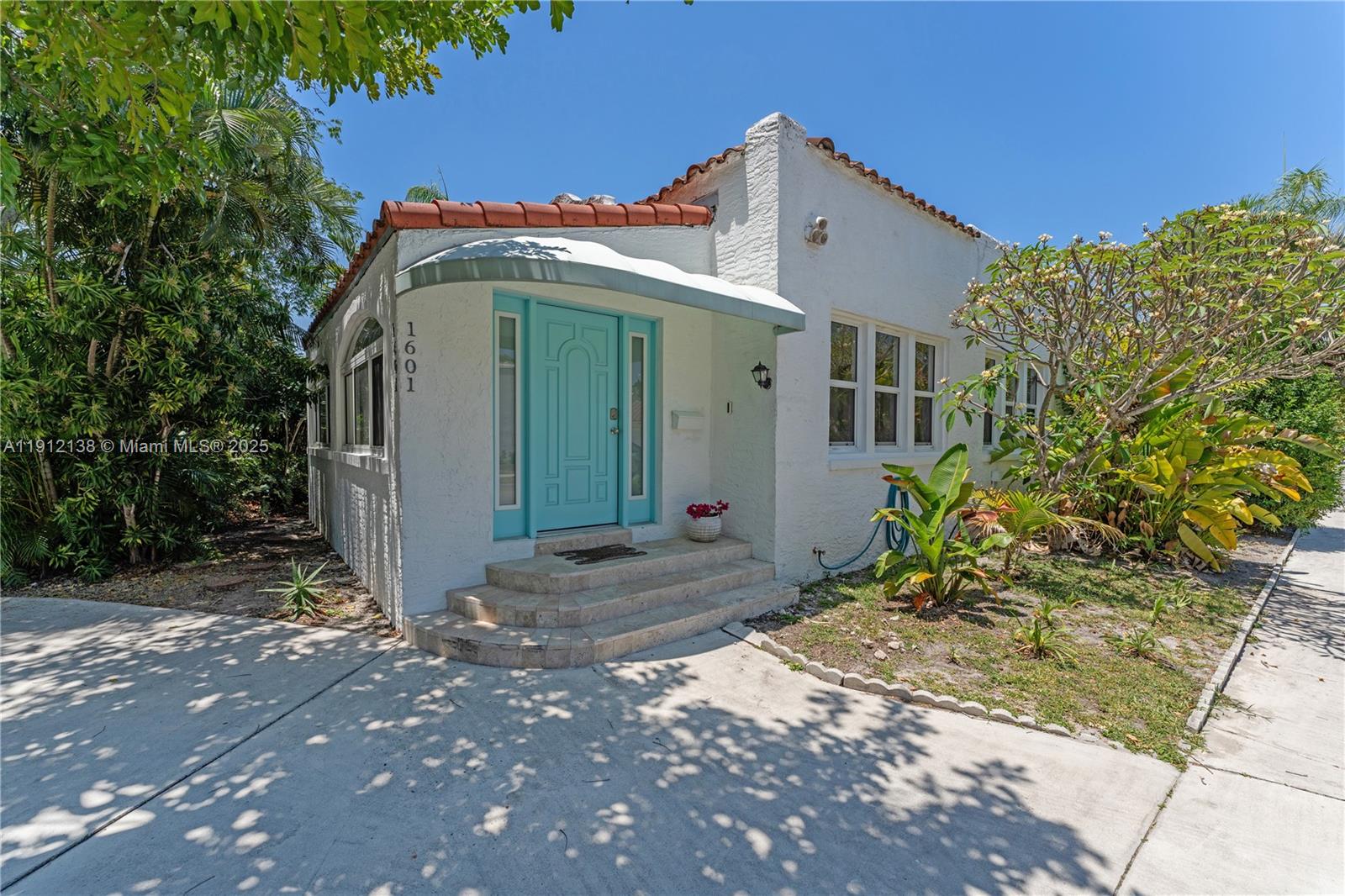 1601 Washington Street Hollywood, FL 33020 - Photo 34 of 41 a front view of a house with a yard