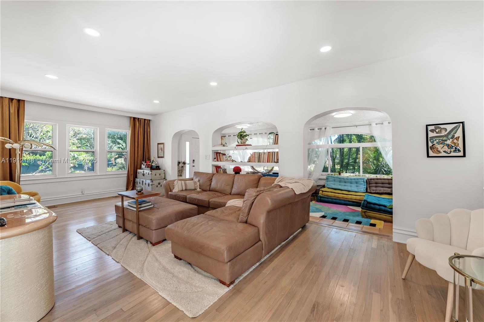 1601 Washington Street Hollywood, FL 33020 - Photo 8 of 41 a living room with furniture and a large window