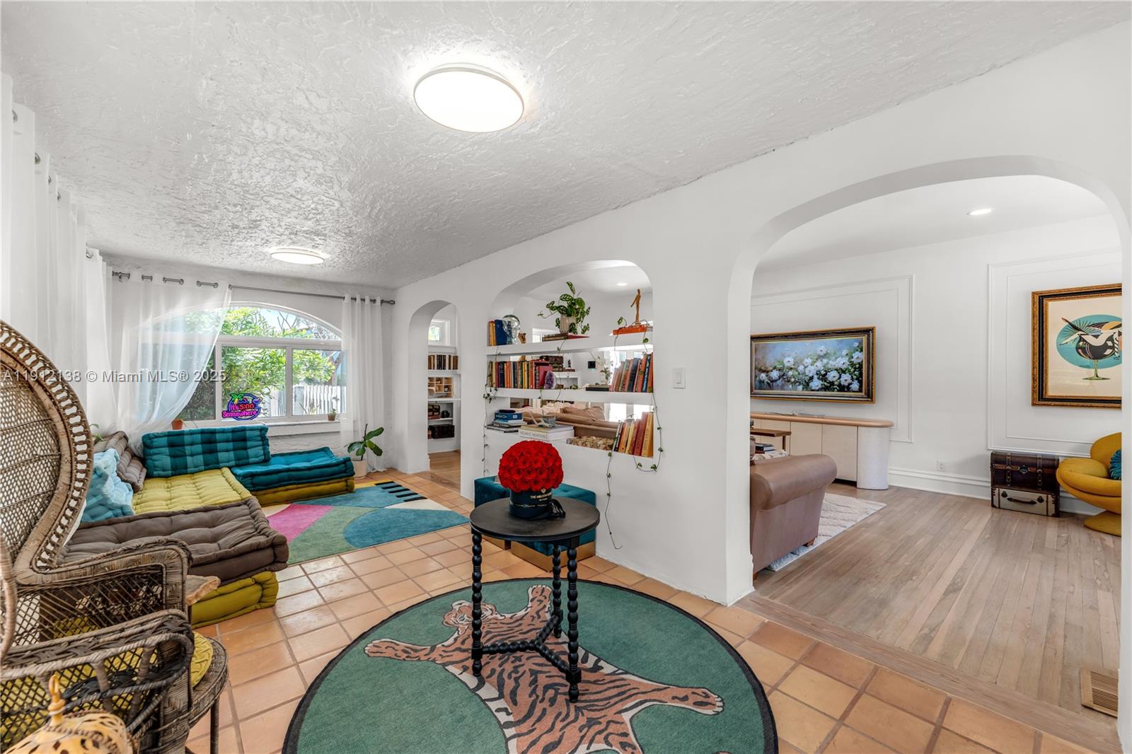 1601 Washington Street Hollywood, FL 33020 - Photo 10 of 41 a living room with furniture and a flat screen tv