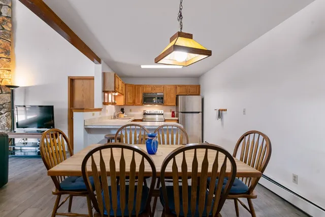a view of a dining room with furniture
