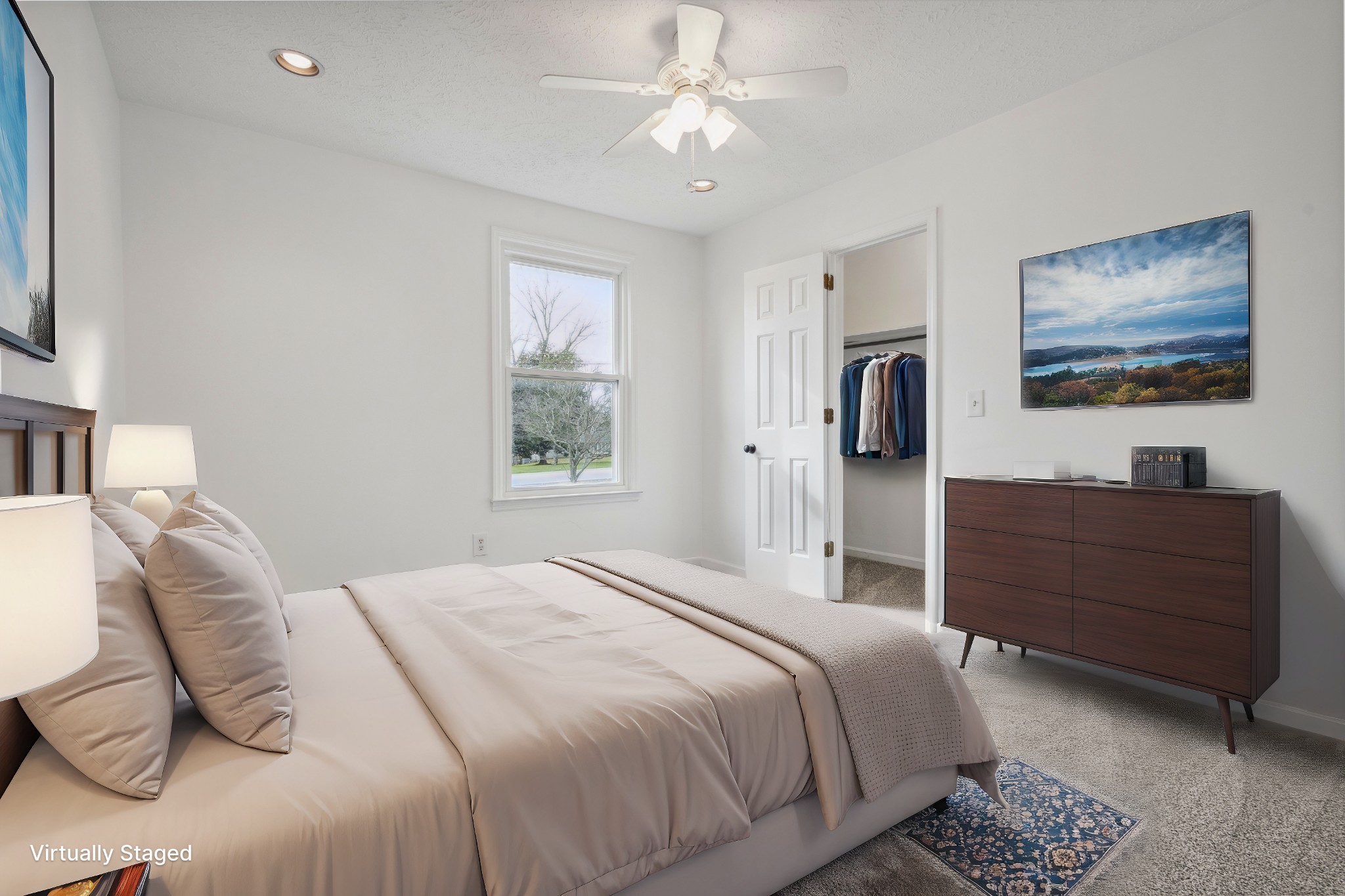 195 Cherokee Road Hendersonville, TN 37075 - Photo 28 of 61 a bedroom with a bed and a flat screen tv