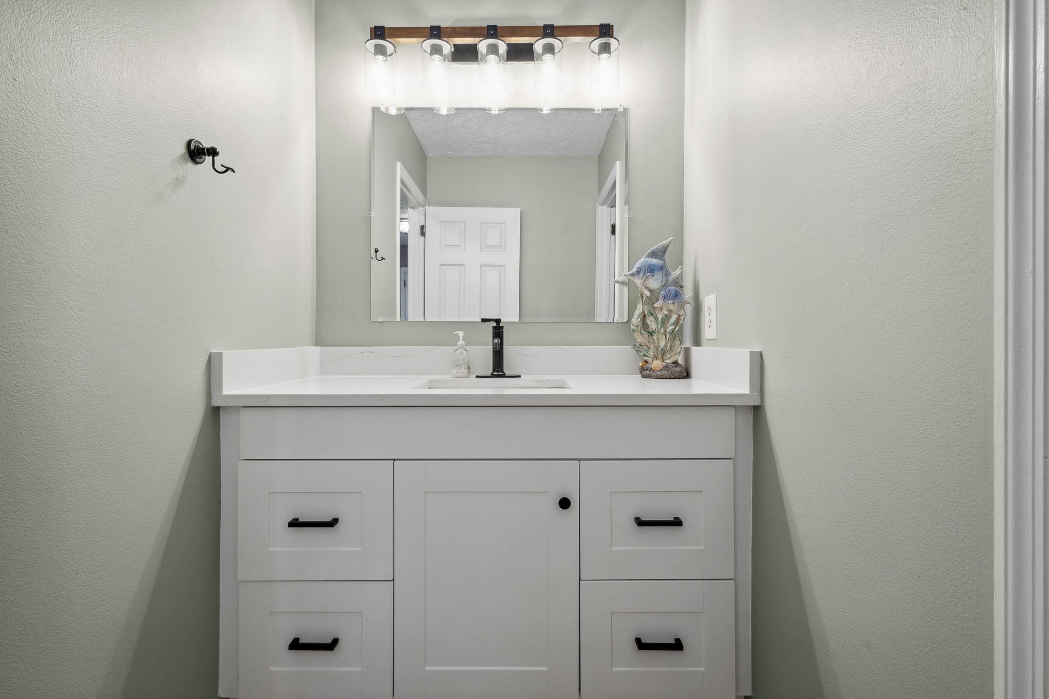 195 Cherokee Road Hendersonville, TN 37075 - Photo 31 of 61 a bathroom with a sink vanity and a mirror