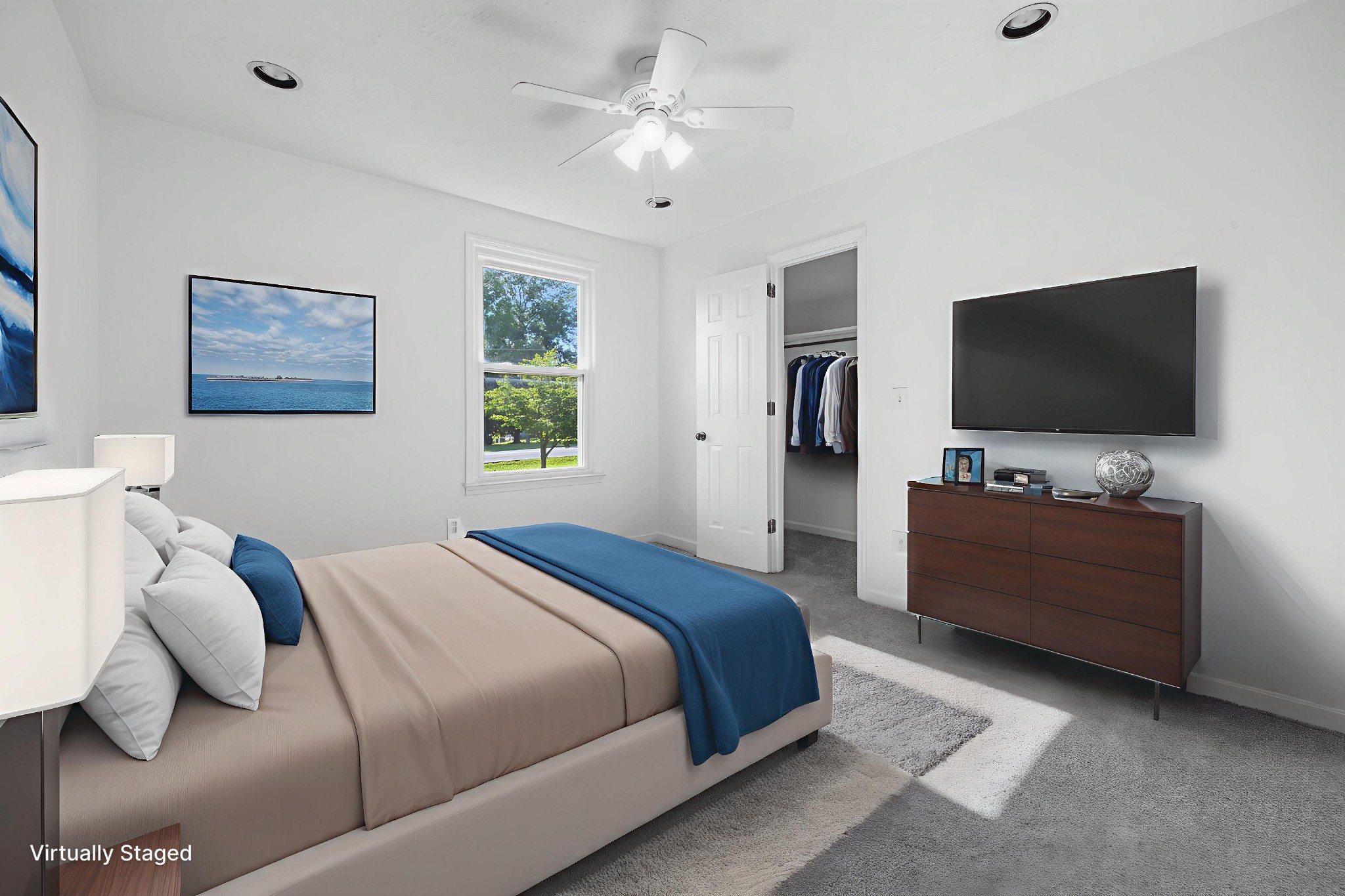 195 Cherokee Road Hendersonville, TN 37075 - Photo 56 of 61 a bedroom with a bed and a flat screen tv