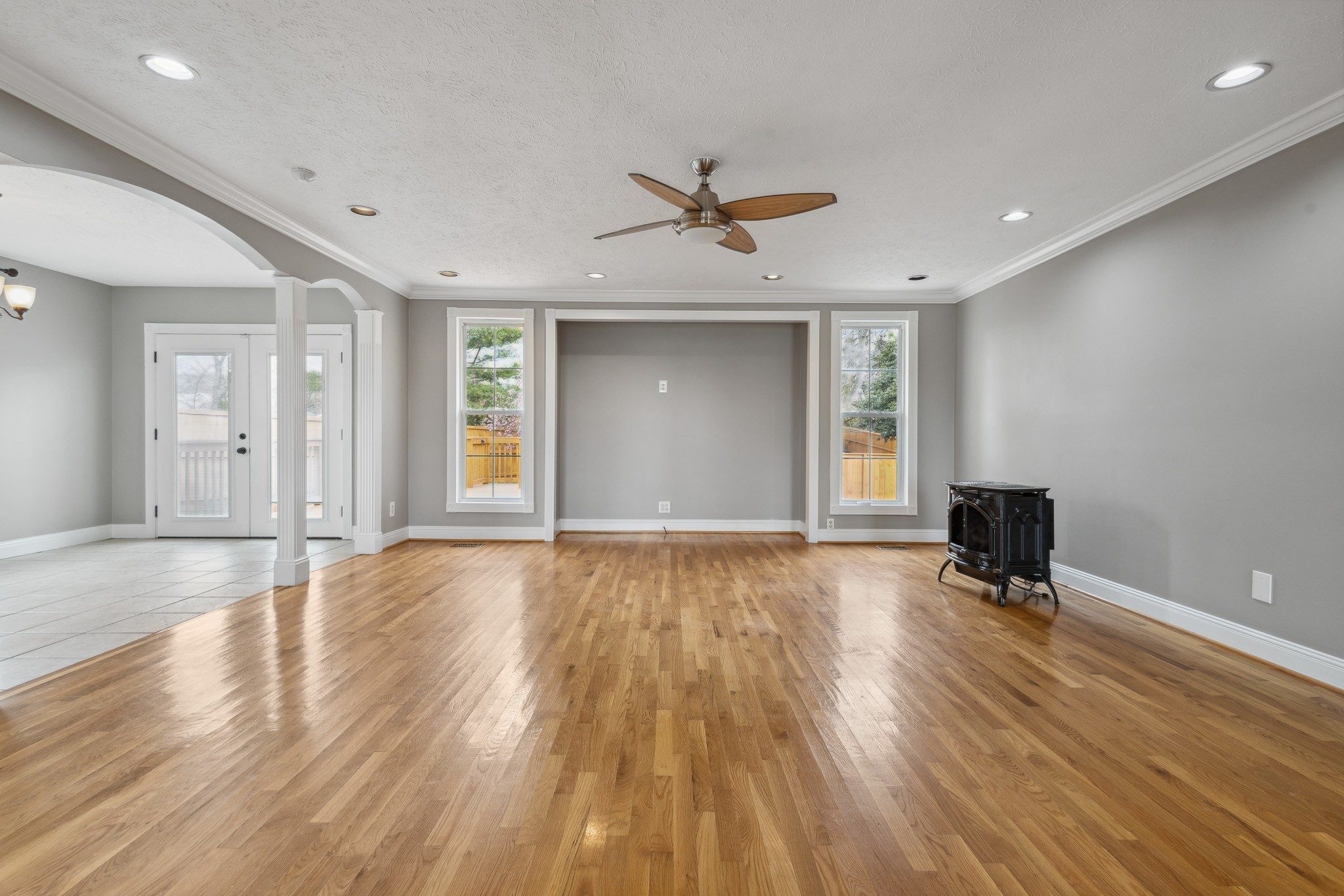 195 Cherokee Road Hendersonville, TN 37075 - Photo 7 of 61 a view of a livingroom with wooden floor and a ceiling fan