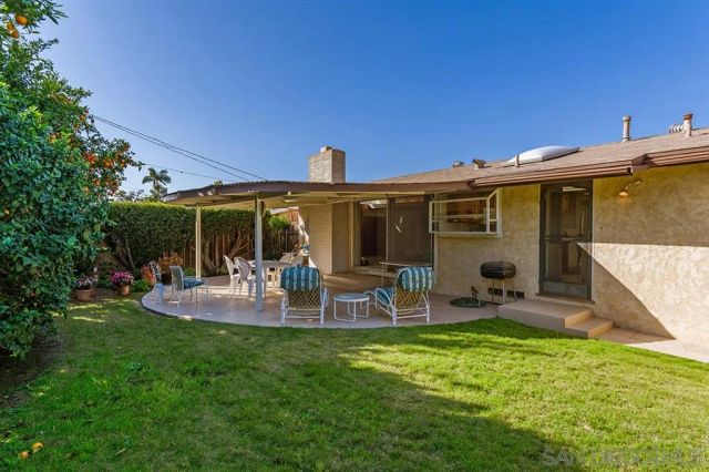 a view of outdoor space yard deck patio and fire pit