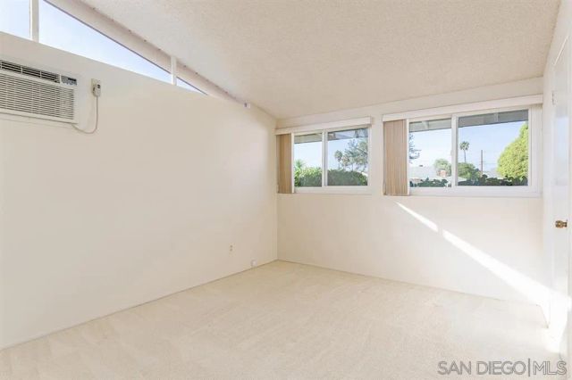 a view of livingroom with furniture and window