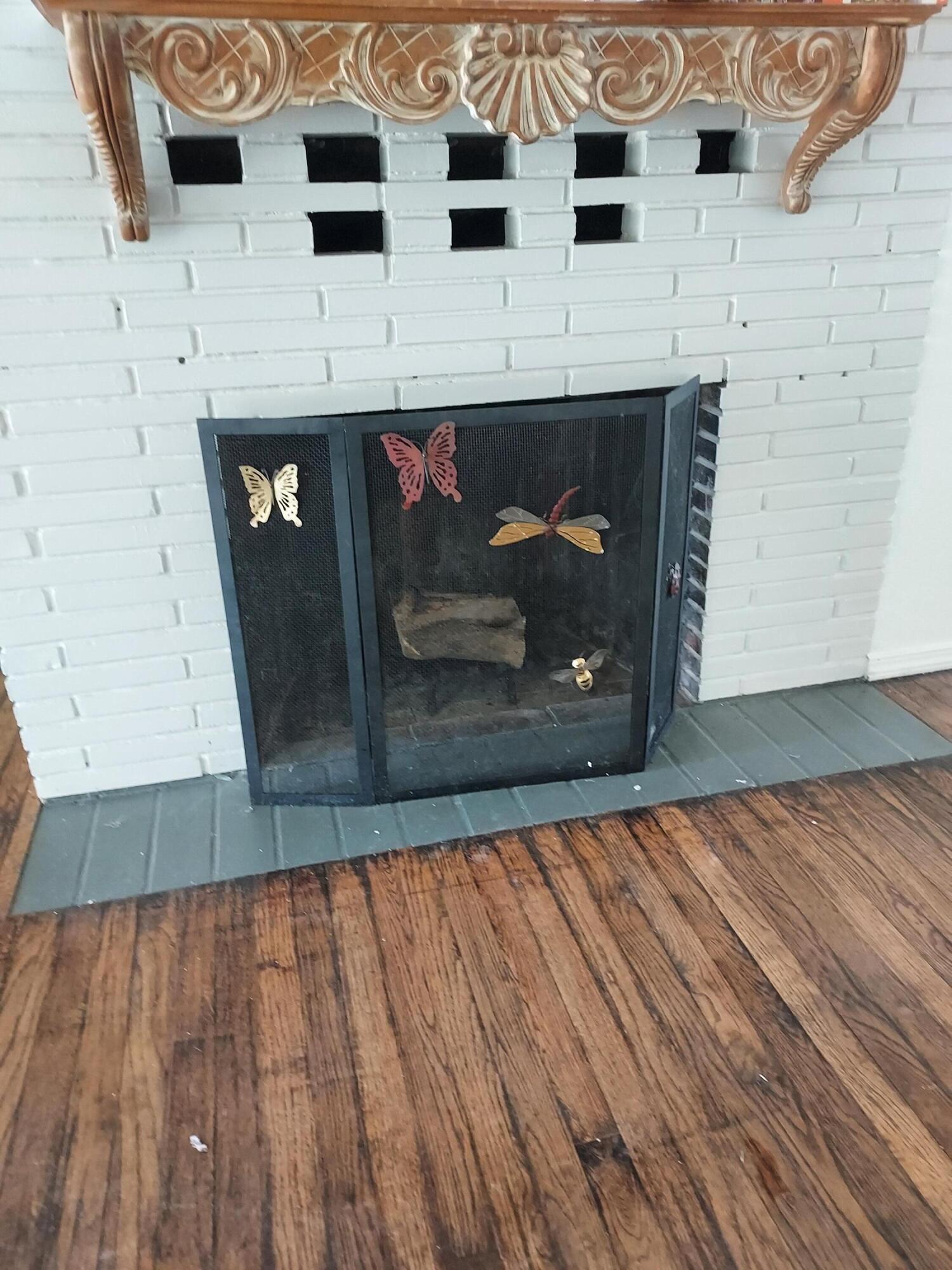 1800 Walbridge Street Red Bluff, CA 96080 - Photo 8 of 14 a view of a fireplace with wooden floor