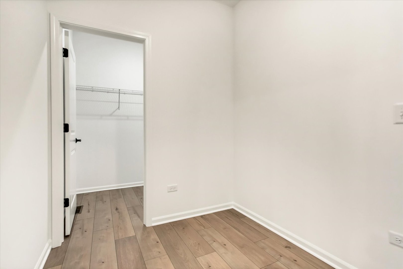17350 Victoria Lane Lockport, IL 60441 - Photo 15 of 29 a view of a small space with wooden floor