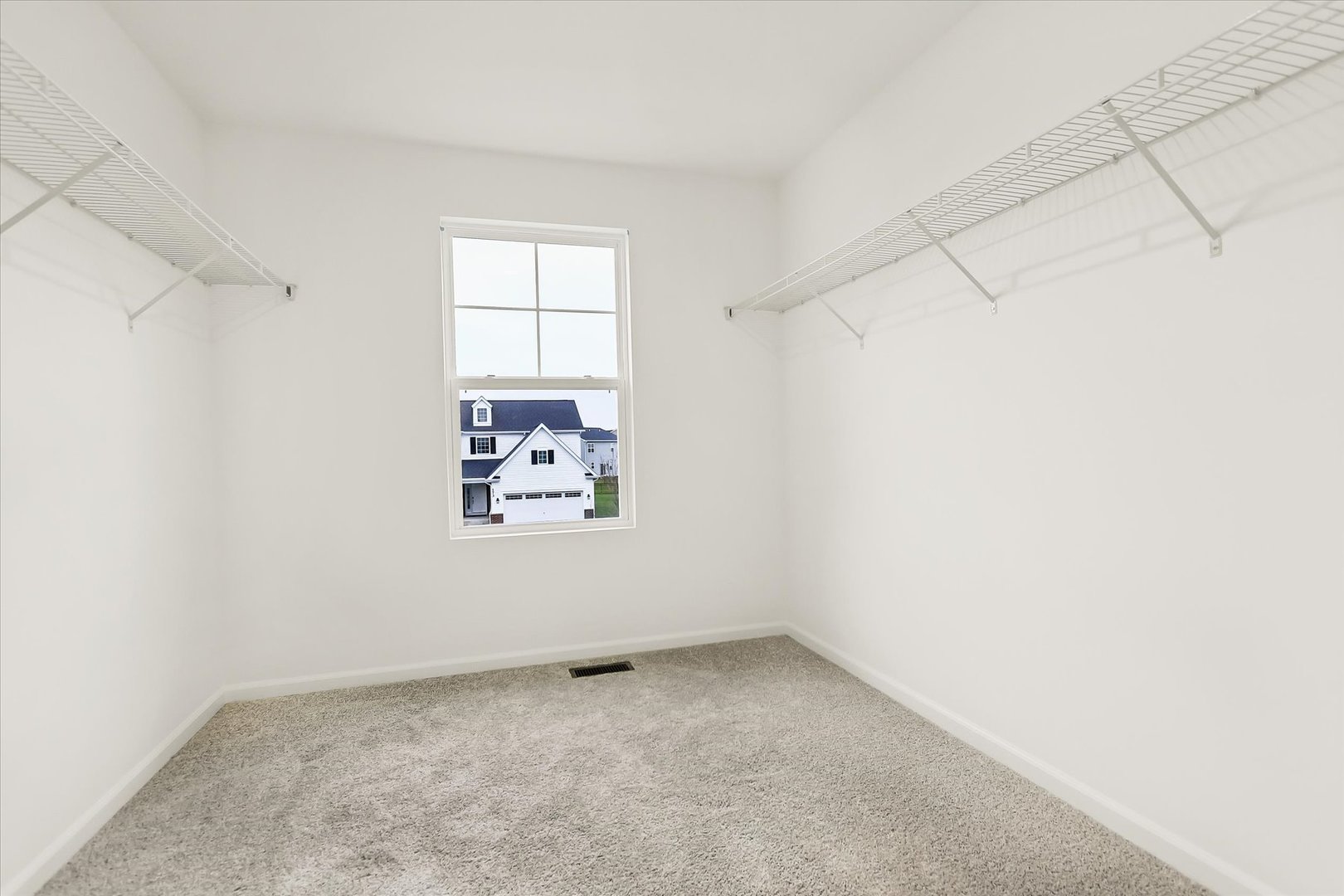 17350 Victoria Lane Lockport, IL 60441 - Photo 19 of 29 an empty room with windows