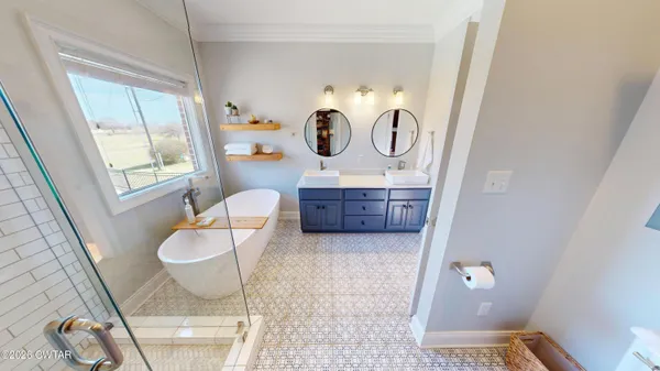 a bathroom with a toilet and a mirror
