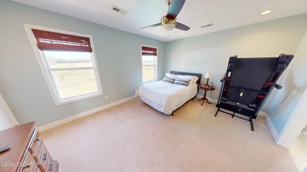 a view of an empty room with working on the wall