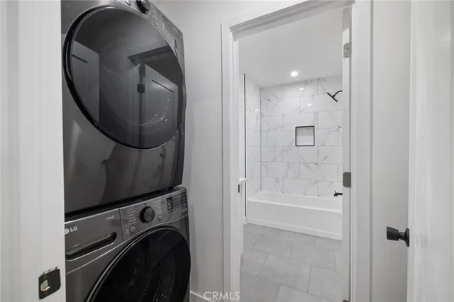 a bathroom with a sink a mirror and a shower