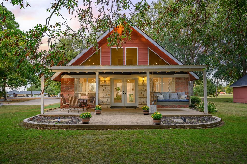 a front view of a house with swimming pool