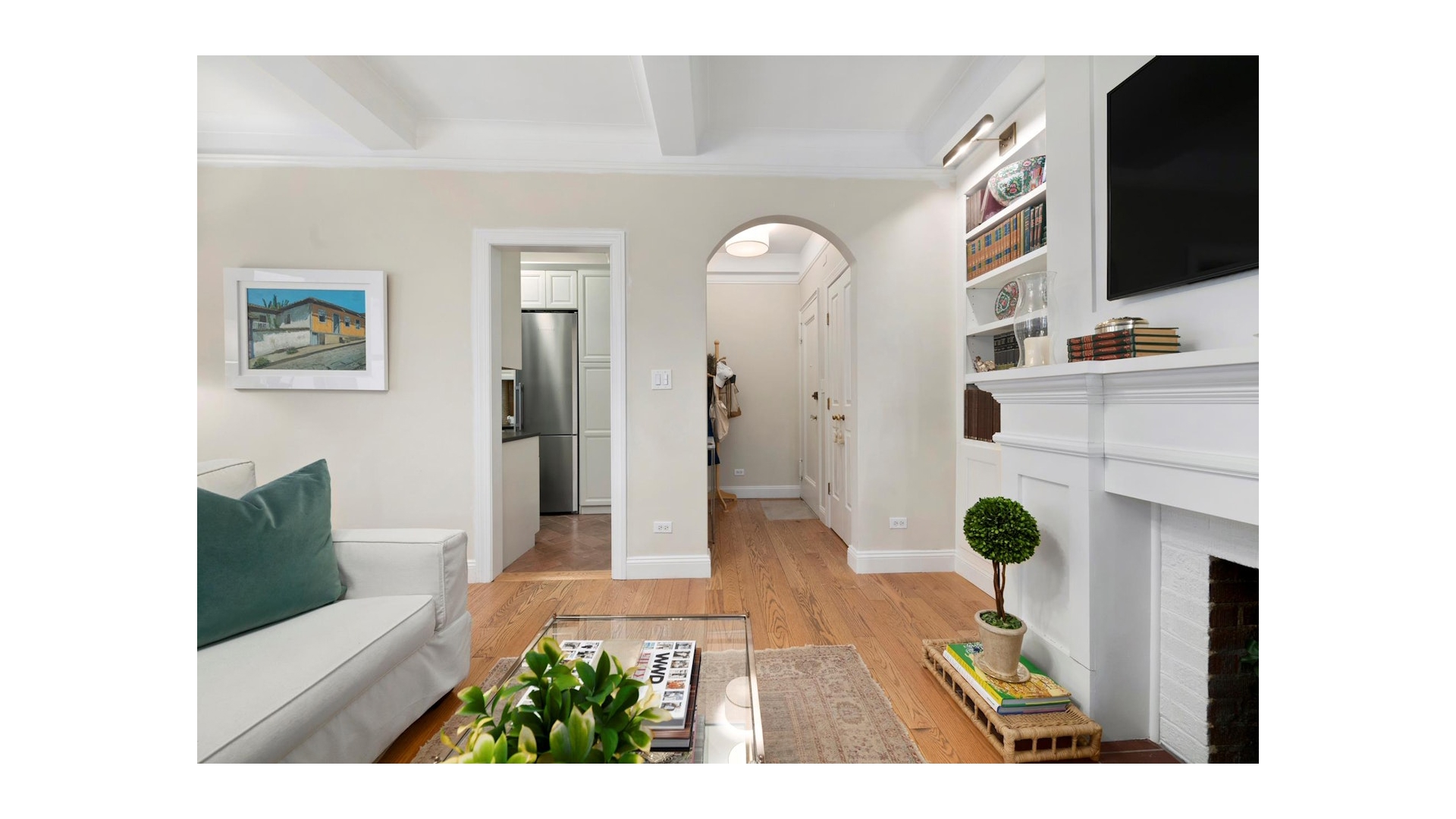 155 East 73rd Street, Unit 1D Manhattan, NY 10021 - Photo 2 of 7 a view of living room with furniture and wooden floor