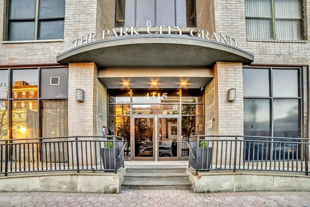 a city street lined with tall buildings