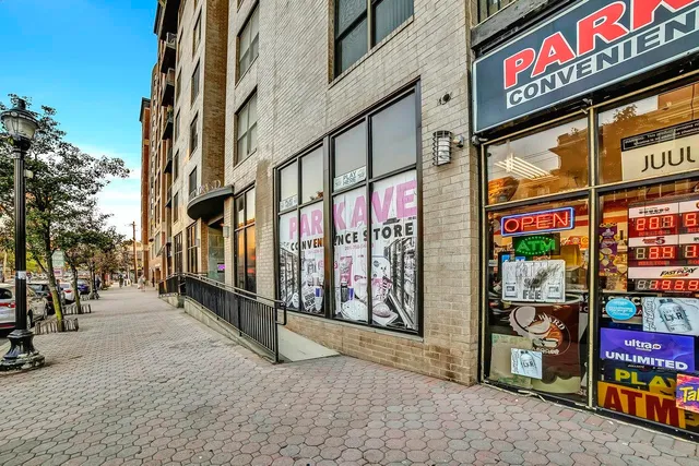 a view of a building with sitting area