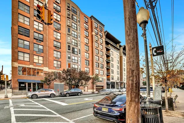 a view of a street with a building