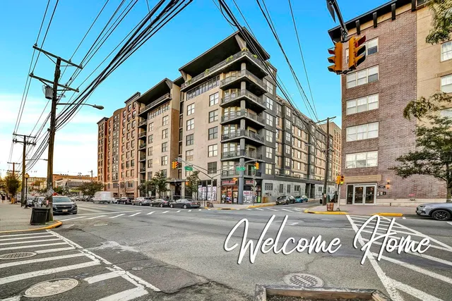 a view of city with tall buildings