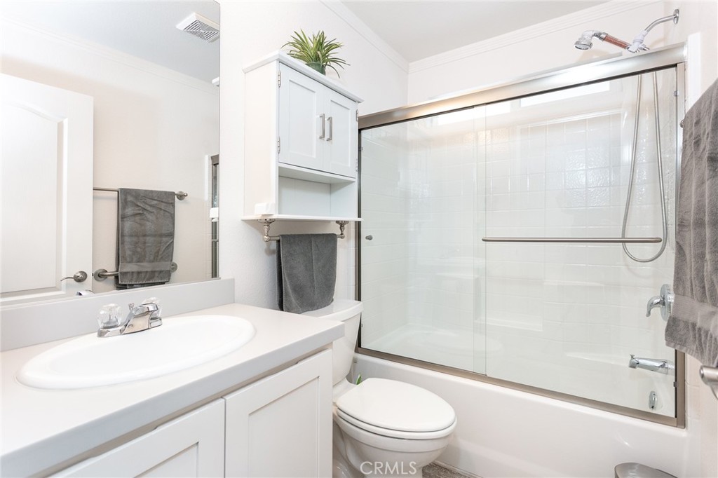 18 Portola Road San Fernando, CA 91345 - Photo 13 of 21 a bathroom with a sink toilet and shower