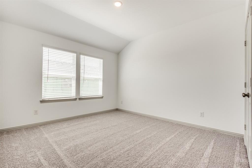 8913 Swallowtail Street Frisco, TX 75035 - Photo 16 of 38 an empty room with a window