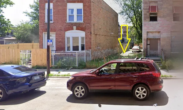 a car parked in front of a house