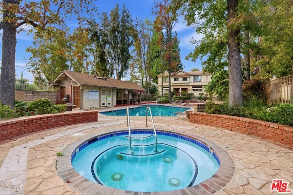 a view of a house with swimming pool