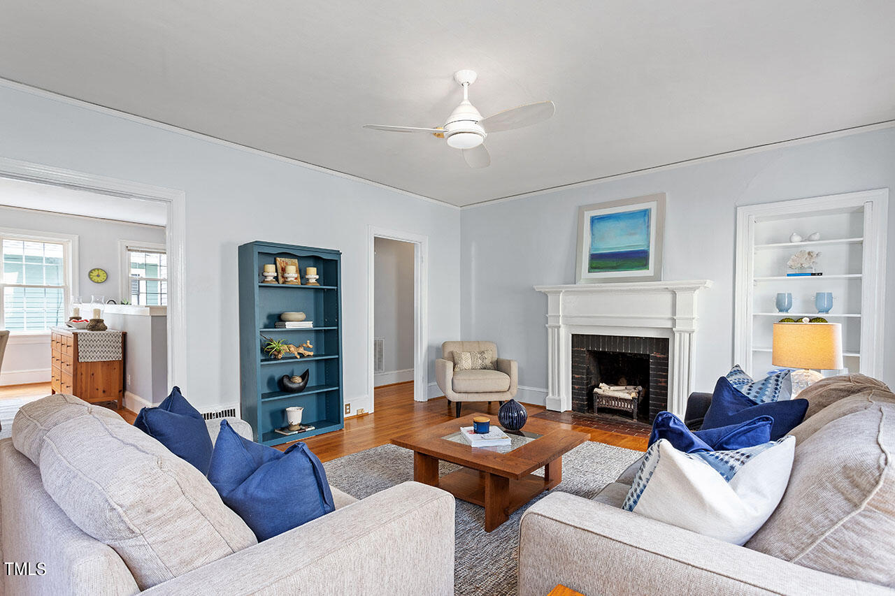 628 East Franklin Street Raleigh, NC 27604 - Photo 11 of 37 a living room with furniture and a fireplace