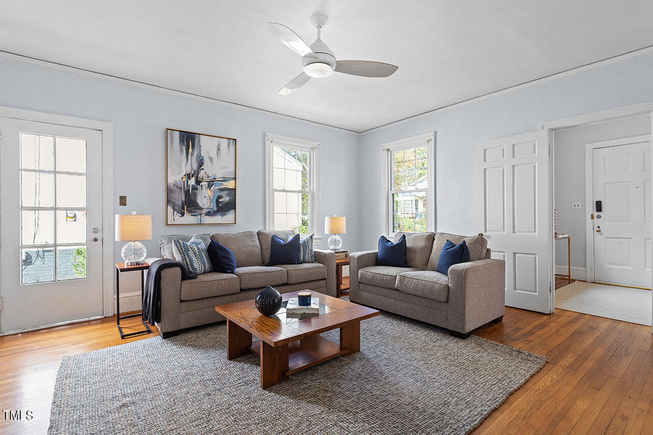 628 East Franklin Street Raleigh, NC 27604 - Photo 14 of 37 a living room with furniture and a window