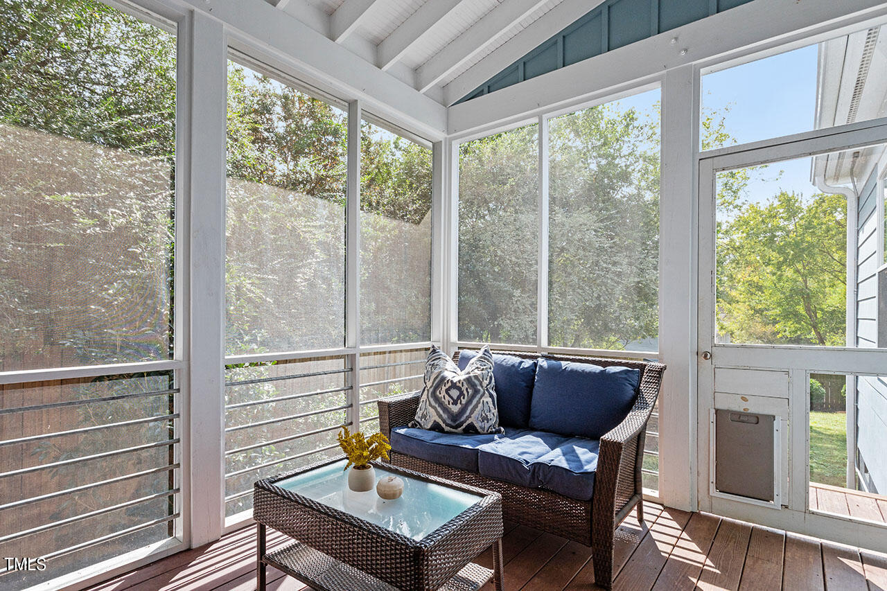 628 East Franklin Street Raleigh, NC 27604 - Photo 32 of 37 a living room with furniture and a window