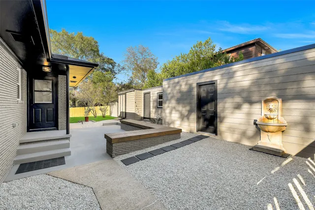 a view of a two couches in the patio of the house