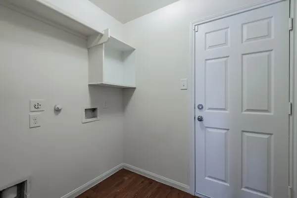 a view of small space with racks on the wall