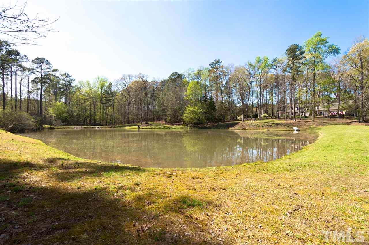 7018 Farmdale Road Raleigh, NC 27610 - Photo 1 of 25 a view of a lake view