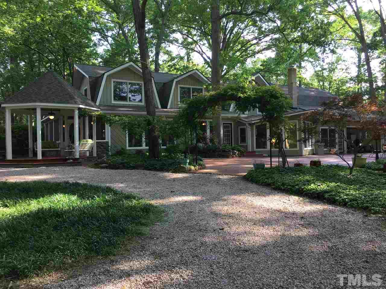 7018 Farmdale Road Raleigh, NC 27610 - Photo 14 of 25 a front view of a house with a yard