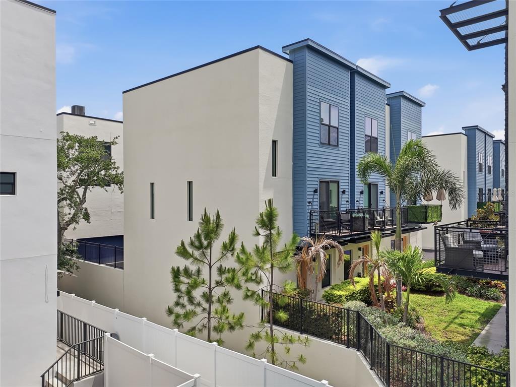 4810 West McElroy Avenue, Unit 30 Tampa, FL 33611 - Photo 37 of 43 a front view of a house with balcony