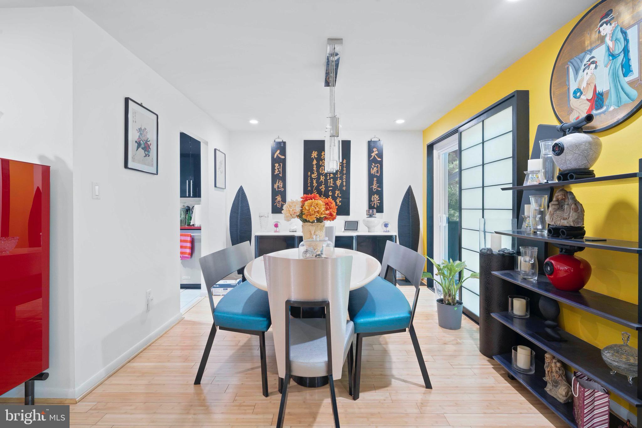 10832 Margate Road Silver Spring, MD 20901 - Photo 11 of 31 a dining room with furniture and wooden floor