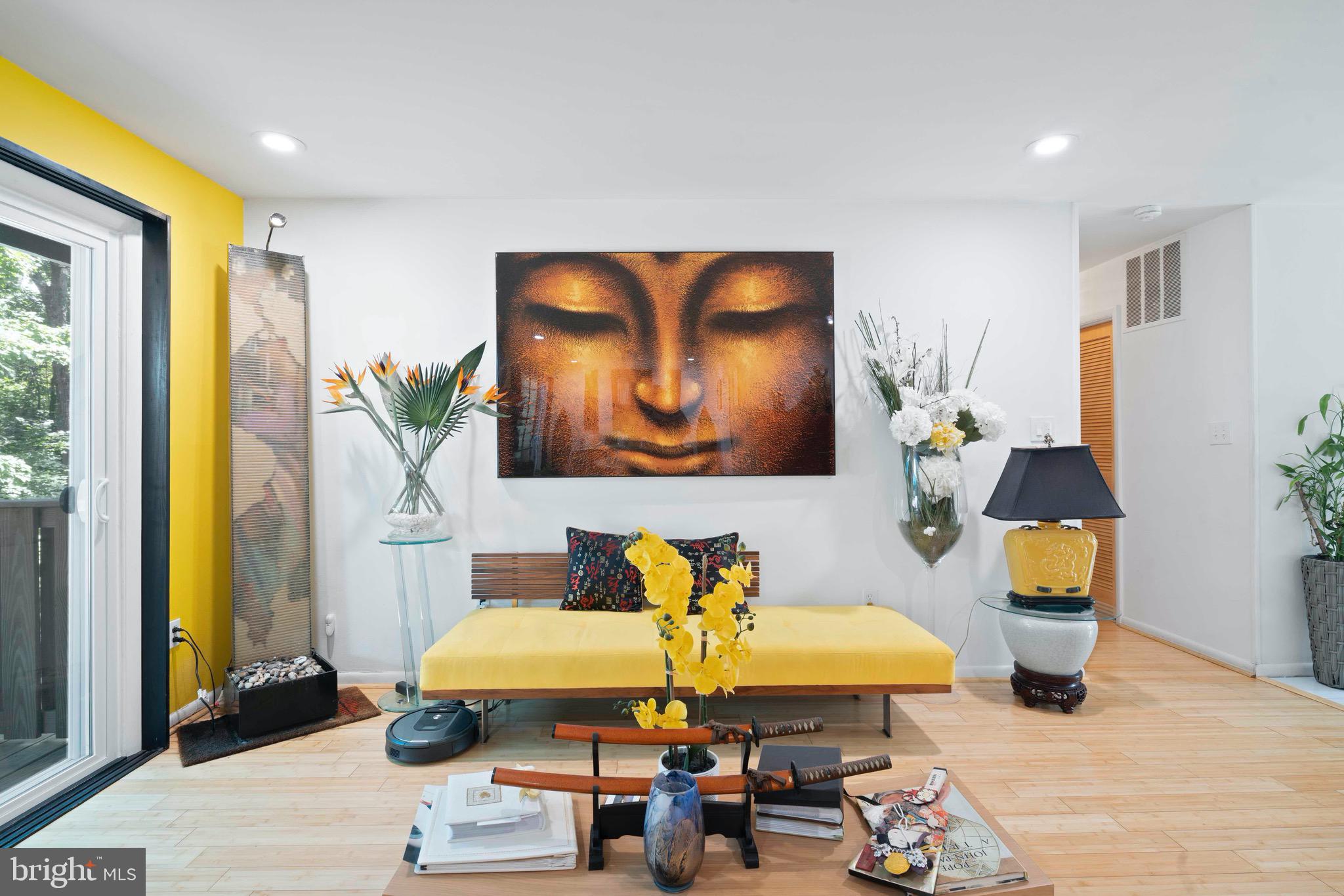 10832 Margate Road Silver Spring, MD 20901 - Photo 12 of 31 a living room with furniture and a painting on the wall