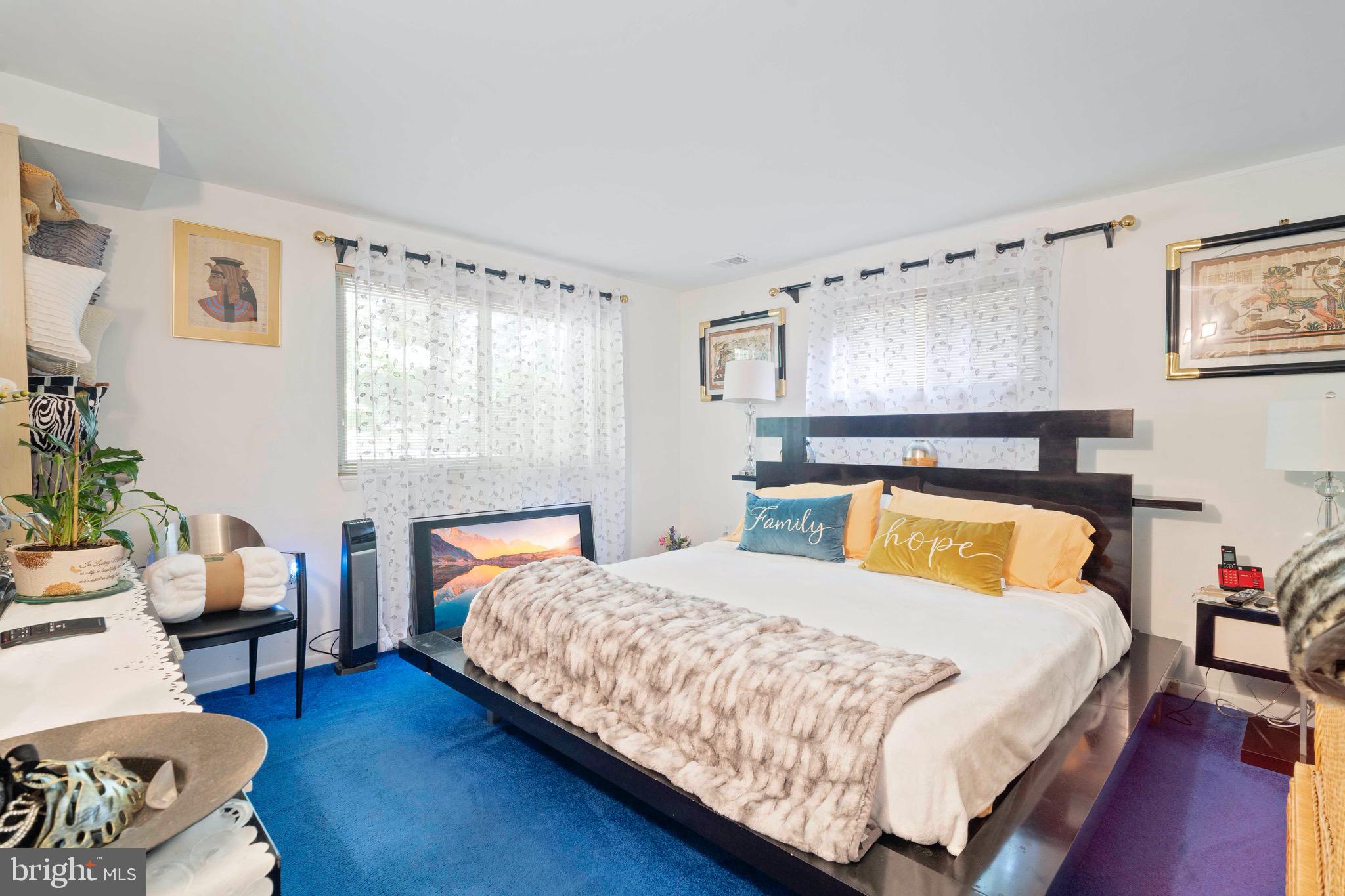 10832 Margate Road Silver Spring, MD 20901 - Photo 14 of 31 a bedroom with a bed and window