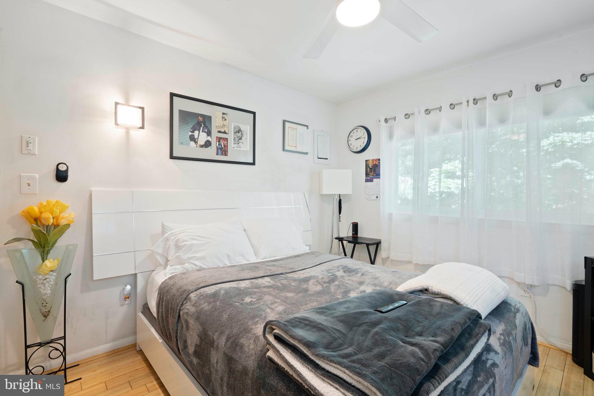 10832 Margate Road Silver Spring, MD 20901 - Photo 21 of 31 a bedroom that has a bed and a dresser in it
