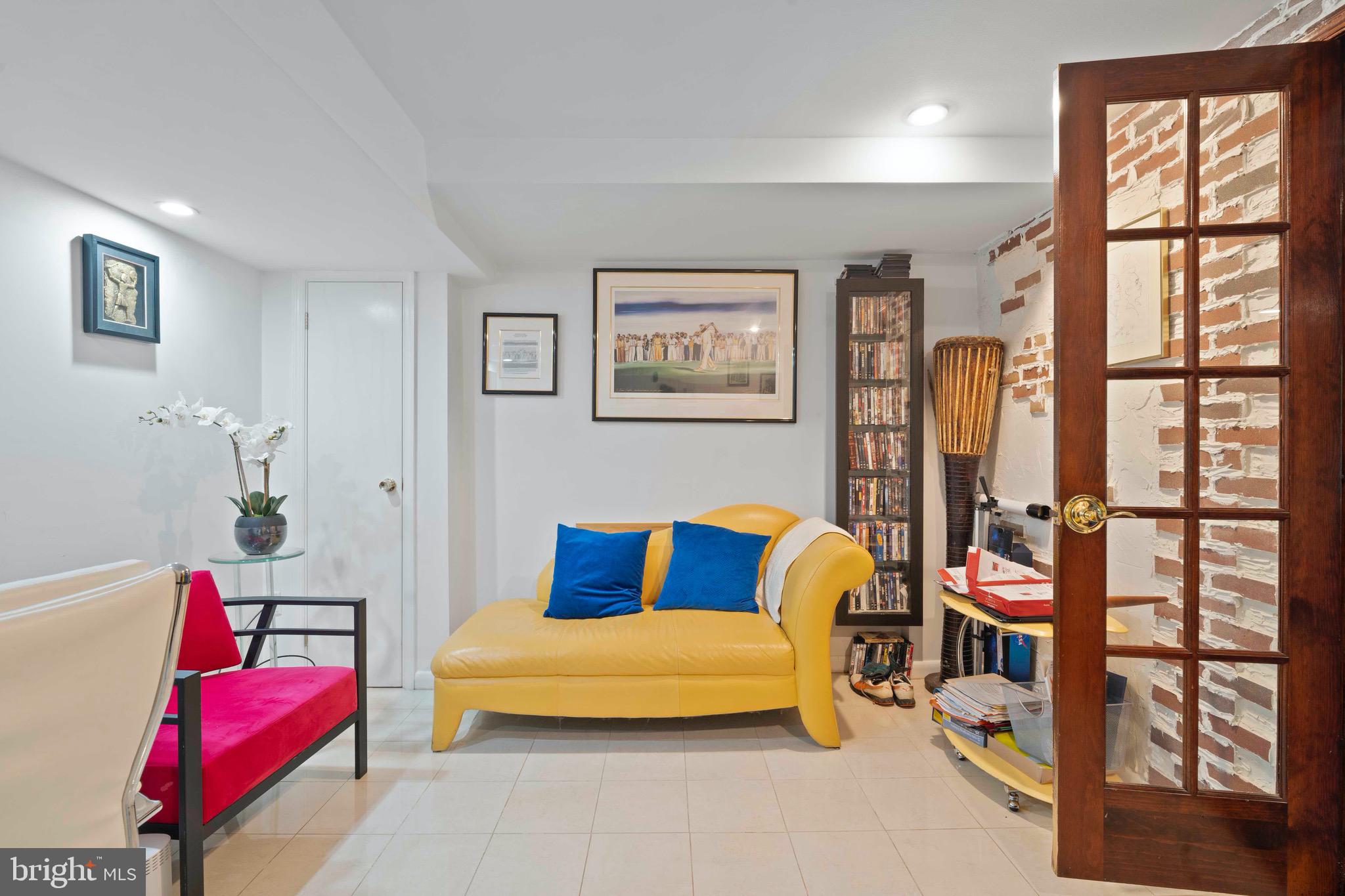 10832 Margate Road Silver Spring, MD 20901 - Photo 24 of 31 a bedroom with furniture and a large window