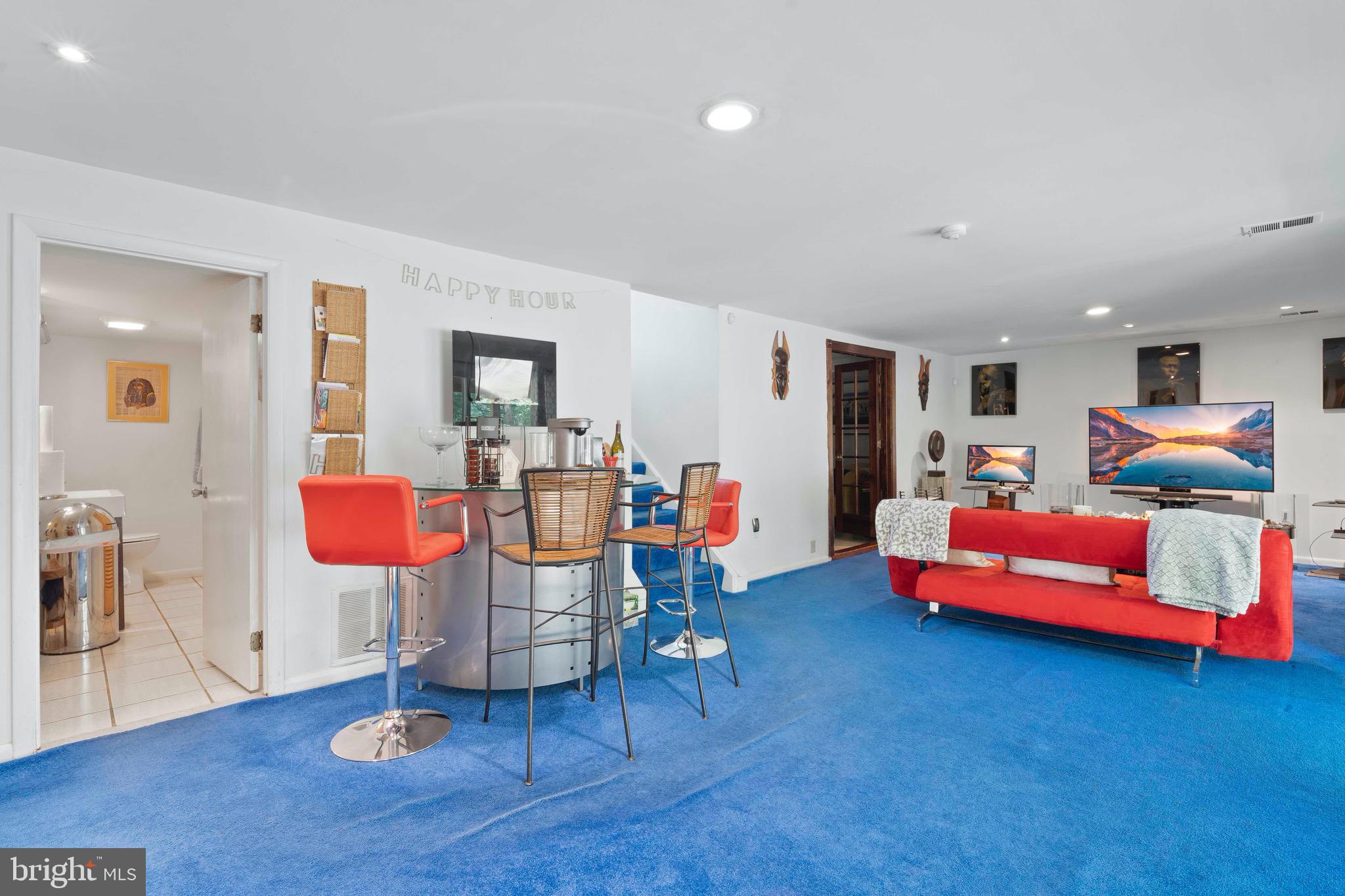 10832 Margate Road Silver Spring, MD 20901 - Photo 26 of 31 a living room with furniture and kitchen view