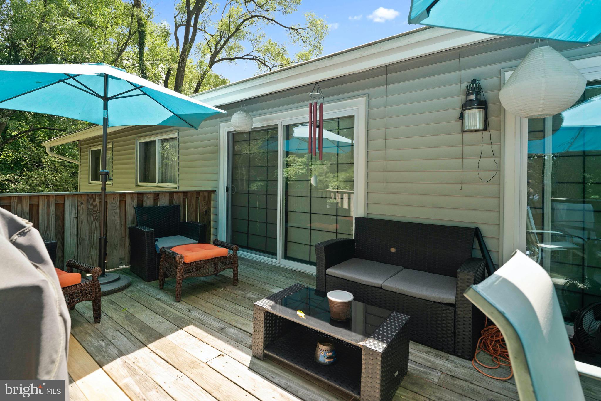 10832 Margate Road Silver Spring, MD 20901 - Photo 30 of 31 a outdoor living space with furniture and wooden floor