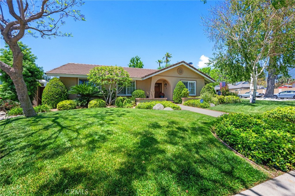 9170 Old Ranch Road Rancho Cucamonga, CA 91701 - Photo 1 of 1 a front view of a house with garden