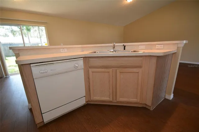a utility room with a sink