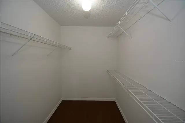 a view of a room with racks on the wall